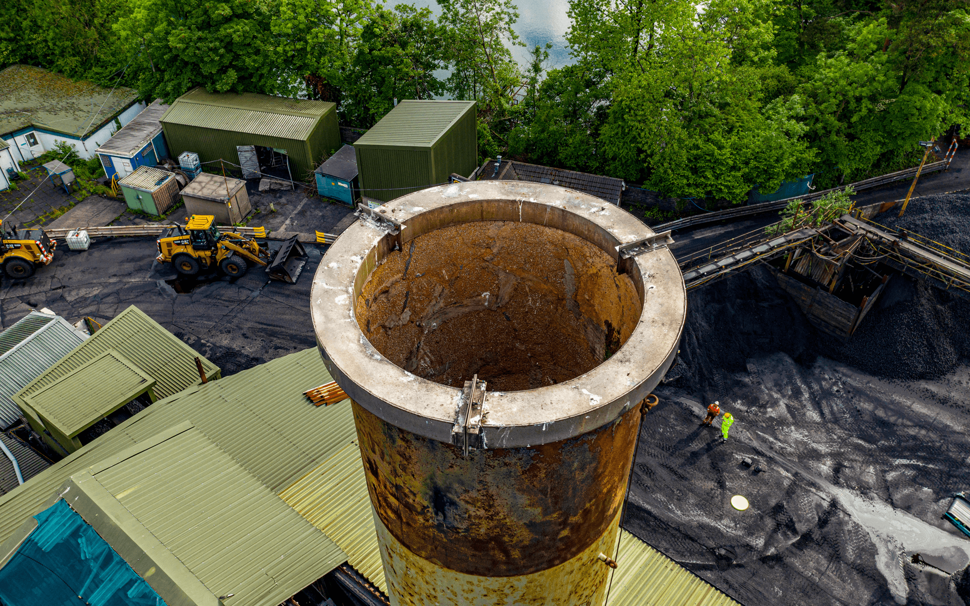 "Mavic 2 Pro" aerial drone photo of a chimney stack conducting an aerial roof survey for "Maxibrite" in Llantrisant, Wales