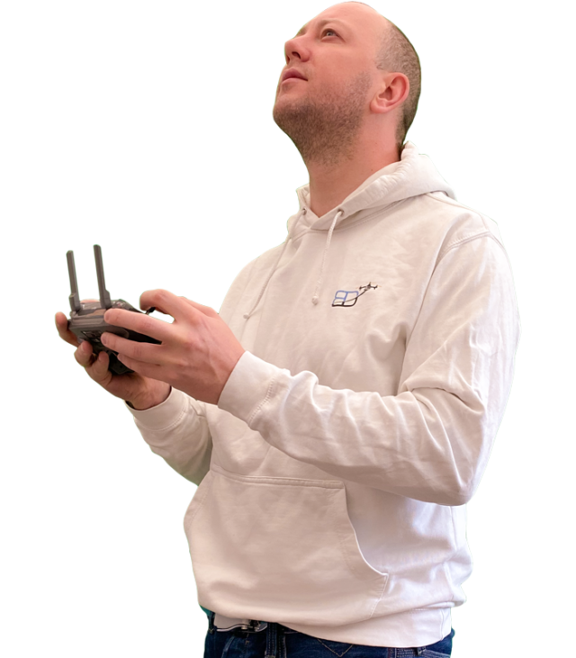 body shot photo of Philippe Francken wearing a Bristol Drones hoody and holding a "DJI" "Mavic 2 Pro" drone remote controller