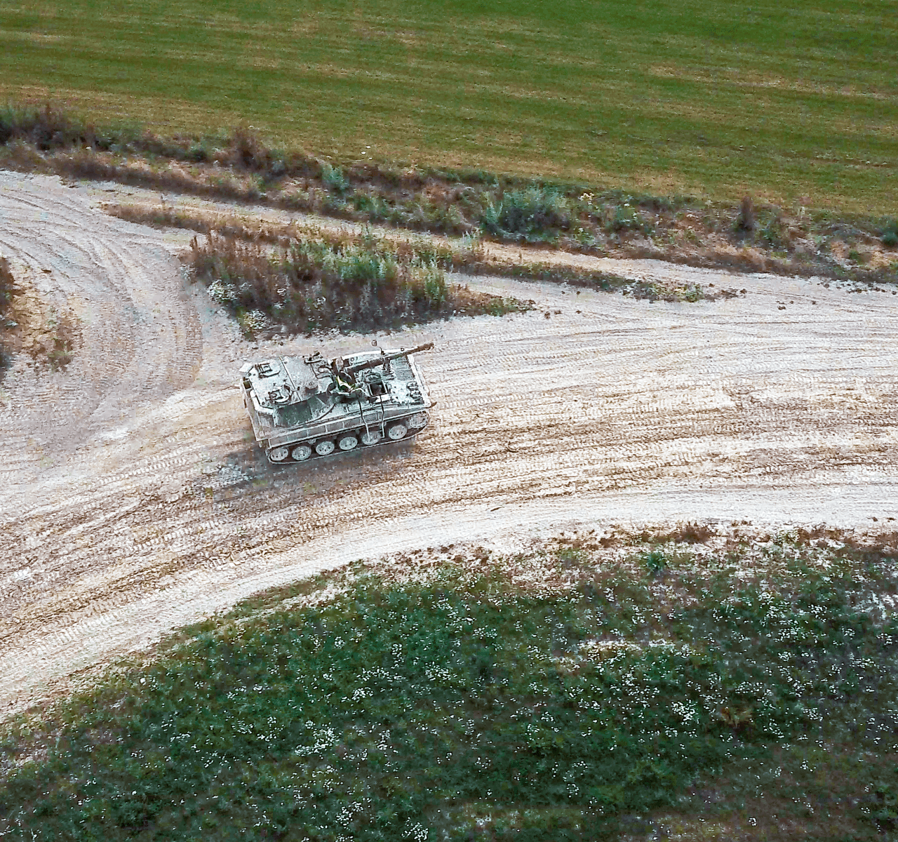 "Mavic 2 Pro" aerial drone photo of a tank driving on a sand track at "Juniper Leisure, Tank Driving" in Winchester