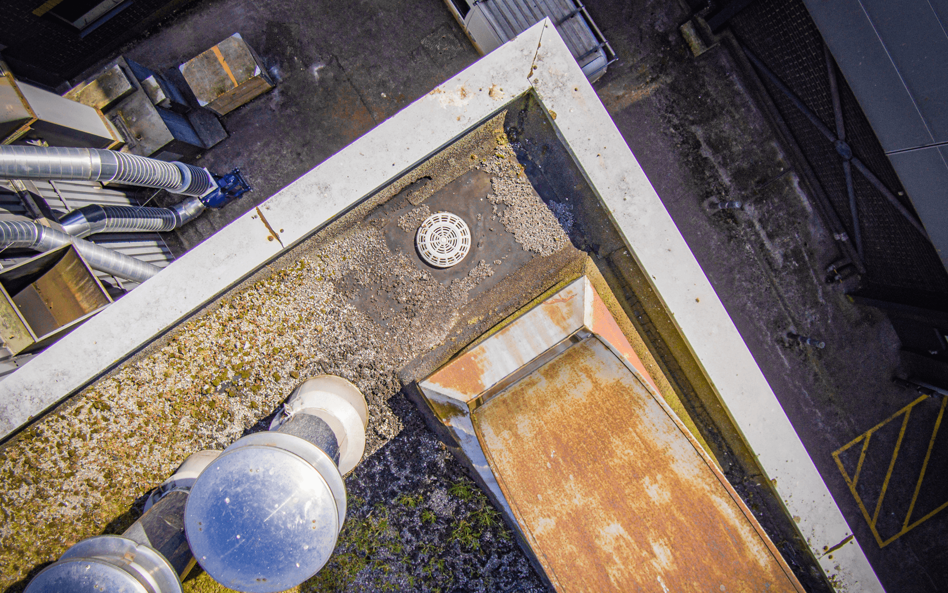 "DJI Inspire 1" aerial drone photo for a roof survey in Midsomer Norton showing a drain and chimneys