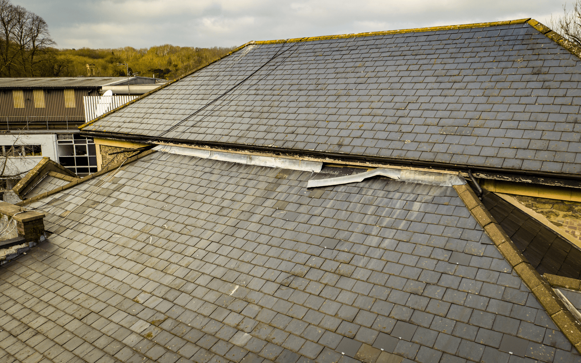 "Mavic 2 Pro" aerial drone photo for a roof survey at "Arnos Manor Hotel" showing damage to the roof